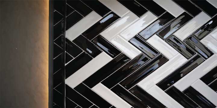 Close up of a black and white herringbone tile pattern on a wall with herringbone background interior geometric abstract contrast bathroom