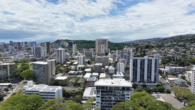 View of Punchbowl Crater surrounded by residential apartments and condos in the Makiki area near Punahou in Honolulu on Oahu, Hawaii. 