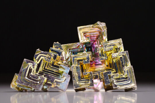 Bismuth crystals. Bismuth - chemical element with symbol Bi and atomic number 83