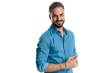 Obraz premium Confident casual man rubbing hands and smiling