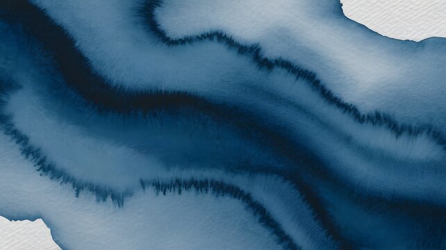 Abstract watercolor wash in shades of blue dark indigo and navy background texture