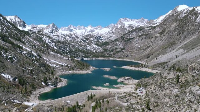 Lake Sabrina California - High Aerial Approach on Summer day with no clouds and clear water 