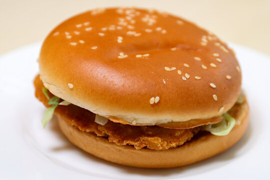 Big Mac on a white plate before eating