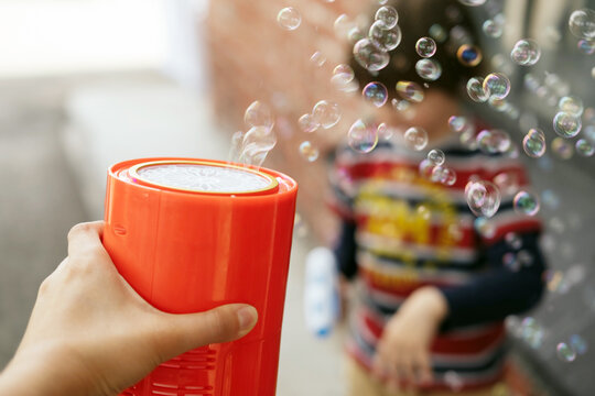 Bubble machine is used for events and parties outdoor. Kids entertainment.