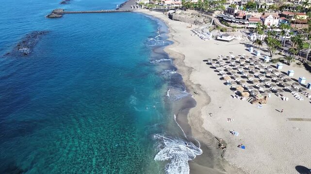 aerial view of Playa del Duque beach, San Andres village and mountains of Tenerife.