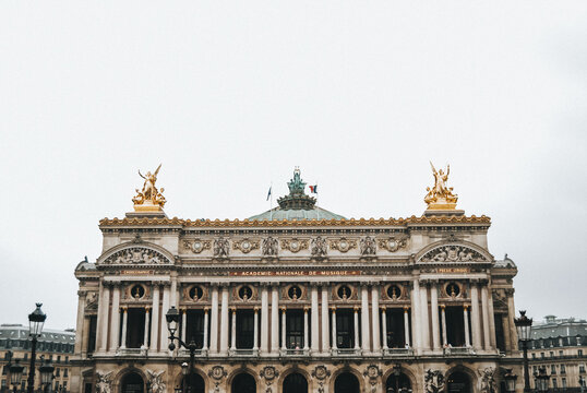 Paris National Music Academy facade with golden statues