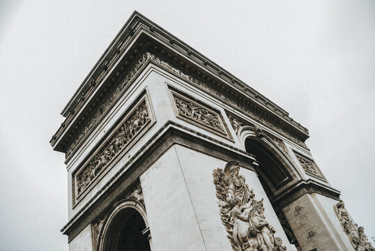 Iconic Parisian monument showcasing intricate sculptures