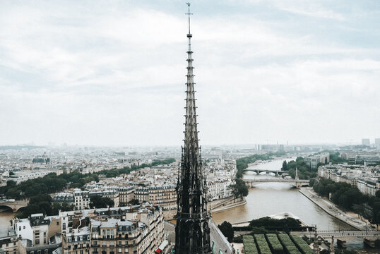 View of Paris with iconic spire and river landscape