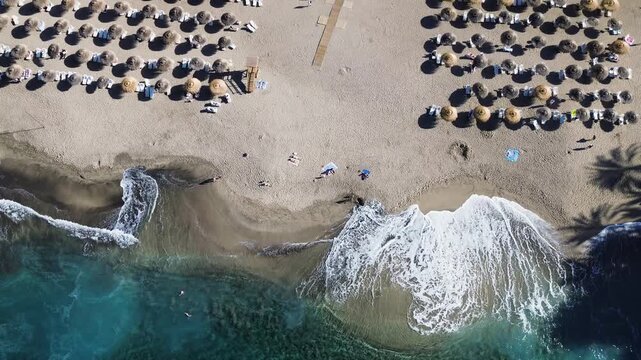 aerial view of Playa del Duque beach, San Andres village and mountains of Tenerife.