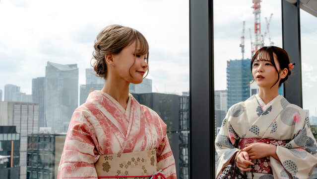 Japanese women in kimono enjoying sakura season in Tokio