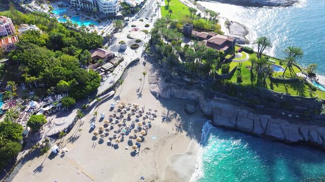 aerial view of Playa del Duque beach, San Andres village and mountains of Tenerife.