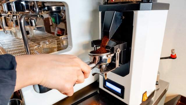 Preparing espresso in a South Korean coffee shop