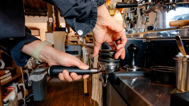 Barista preparing espresso in Korean coffee shop