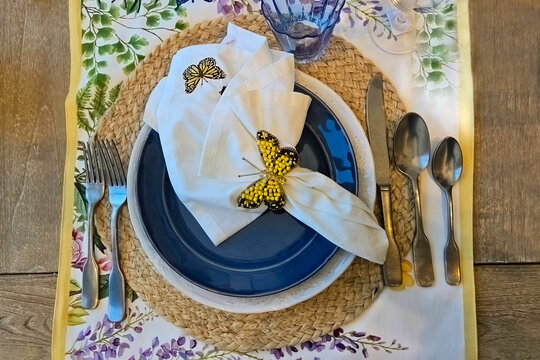 Spring dinnerware with a butterfly theme. 