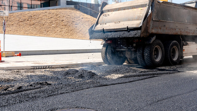 Asphalt paving process on urban street