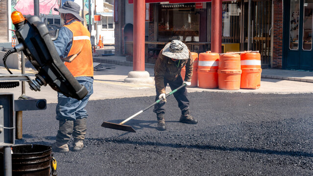 Asphalt paving workers in Gyeongju, South Korea