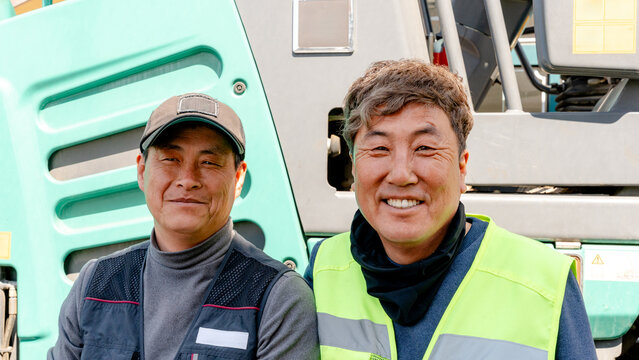 Workers on road repair project in Gyeongju, South Korea