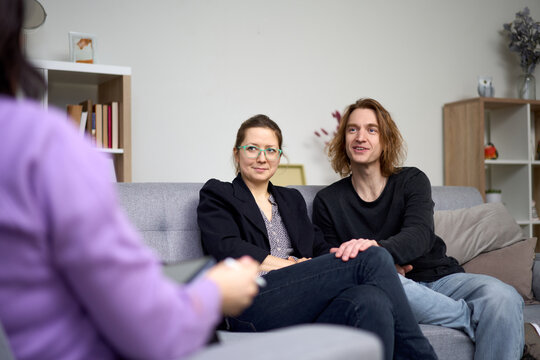 Couple listening to therapist guidance during counseling