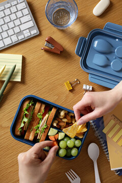 Healthy office lunchbox with bento snacks on desk