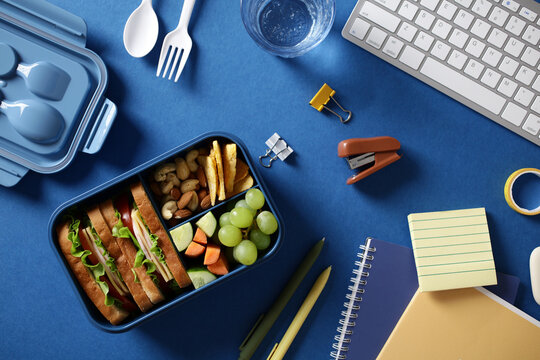 Modern blue bento box with balanced lunch ingredients