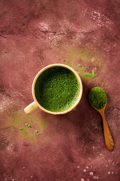 Minimal zen matcha latte with ceremonial powder flat lay