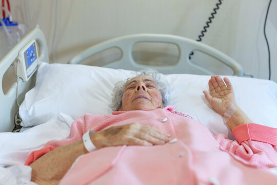 Elderly patient resting in hospital bed for care