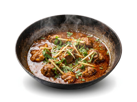 Chicken karahi or mutton korma in a wok isolated on white background