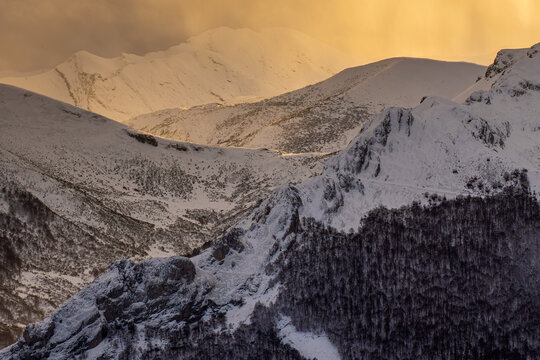 Winter sunset over snowy Picos de Europa near Fuente D&eacute;
