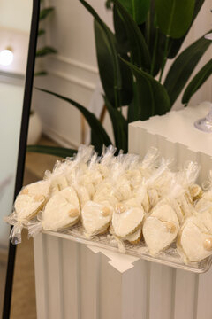 Wedding engagement cookie favors displayed for ceremony