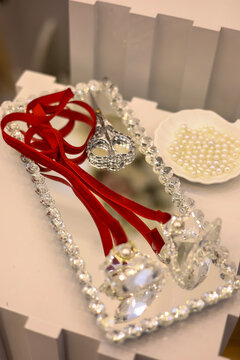 Engagement and wedding ceremony decor on crystal tray