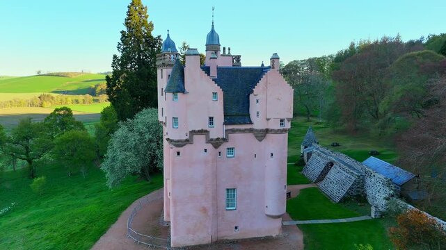 Cinematic Drone Shot of Craigievar Castle: Aerial View of the Pink Fairy Tale Fortress in Scotland