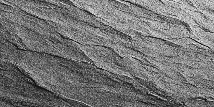 Intricate textures and patterns of natural slate create a stunning visual, highlighting the inherent beauty of geological formations.