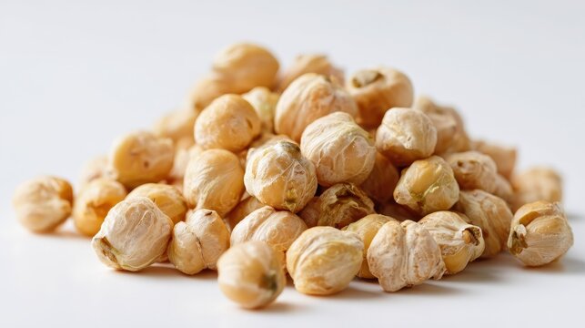Garbanzo beans close-up on a clean white backdrop, isolated mound