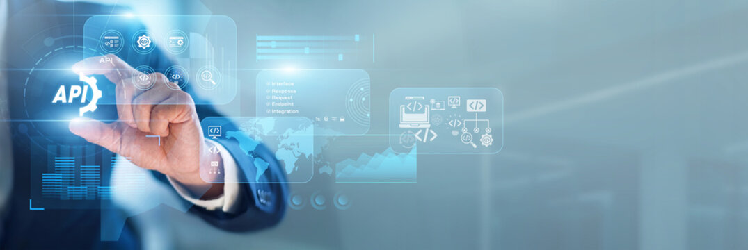 DevOps engineer hand-holds API integration points within network architectures for data exchange. Software interfaces allow different applications to communicate effectively today.