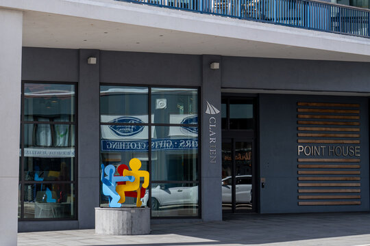 Hamilton, Bermuda - April 19, 2026: Public art piece Untitled (Three Dancing Figures) by pop artist Keith Haring in front of the Clarien Bank in Point House on Front Street.