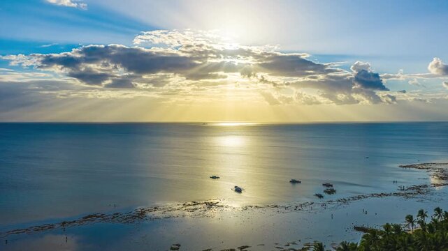 A Serene View of Calm Waters Reflecting the Soft Morning Light at Mahaba Beach, Tangkaan, Padre Burgos, Southern Leyte, Philippines - Hyperlapse