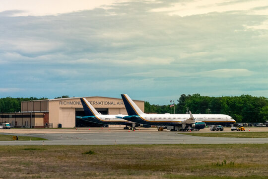Richmond International Airport, Richmond, Virginia, USA - April 28, 2026 - Two United States Department of Justice unmarked Boeing 757-223 aircraft, N874TW and N119NA, parked at RIC Con Air, Shuffle