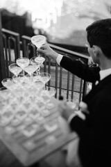 All attendees savor classy outdoor events with bubbling champagne and cheer © VolodymyrNadtochii