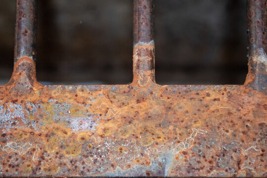 rusty metal gutter or manhole covers