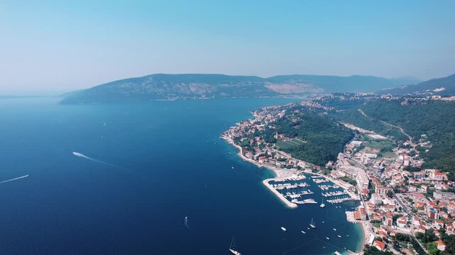 Breathtaking aerial shot of maritime village and port activity