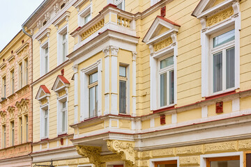 Elegant historic european architecture with ornate details and cream facade © Iurii Gagarin