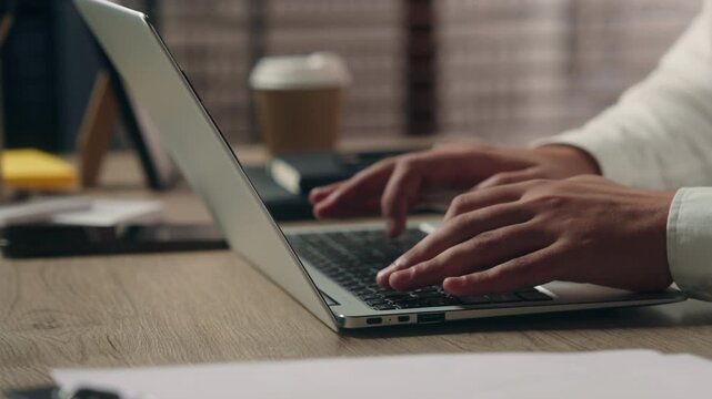 Unrecognizable Caucasian man male hands typing laptop indoor office developer CEO businessman searching information online using computer cyberspace employer technology business writing code internet