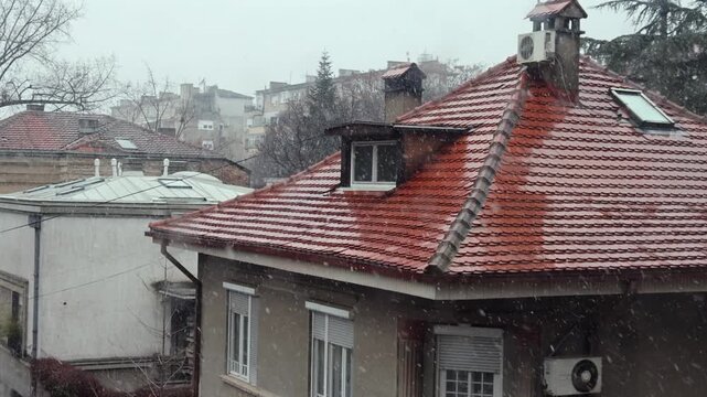 Wet Roof Tiles at House Snow Winter Bad Weather