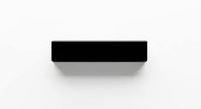 Black rectangular object on surface.