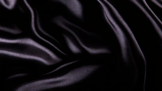 Elegant Black Silk Fabric Waving in Slow Motion Abstract Luxury Background