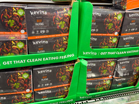 Prosper, Texas, USA - May 06th, 2026: Kevin's Natural Foods beef fajitas boxes stacked in green display in Costco Wholesale warehouse store