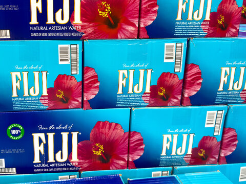 Prosper, Texas, USA - May 06th, 2026: Fiji natural artesian water boxes with hibiscus flower design displayed in Costco Wholesale warehouse store