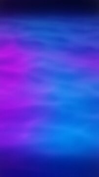 Blue and purple vertical smoke mist with soft swirling texture and ethereal glow for mysterious and gothic portrait format motion backgrounds