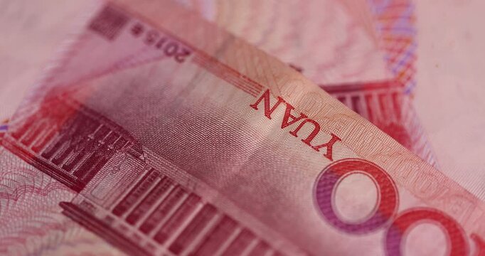 Chinese money with a face value of 100 yuan, Chinese cash in red with national symbols of China