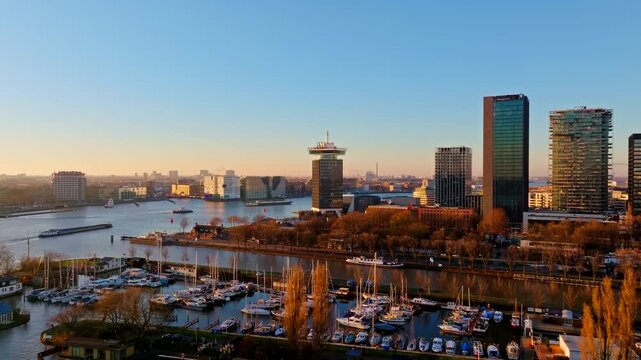 Sunset Drone View Over Amsterdam North and IJ Waterfront 4K